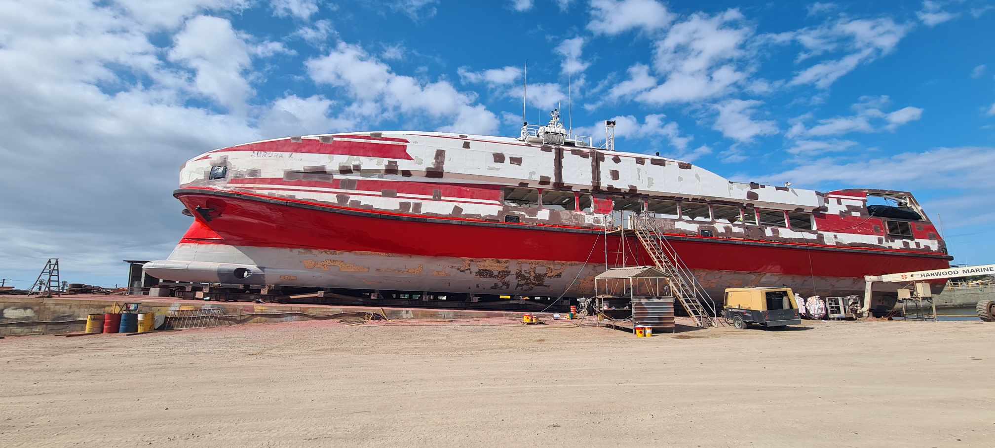 Ferry, Aurora V on Yamba Slipway being prepared for paint.